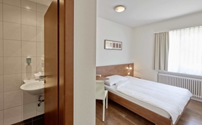 A standard single hotel room in Sorell Hotel Sonnental Zurich-Dübendorf