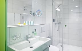 Une salle de bain dans le Sorell Hotel Rütli Zurich
