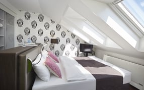 A superior double king-bed room in Sorell Hotel Rütli Zurich