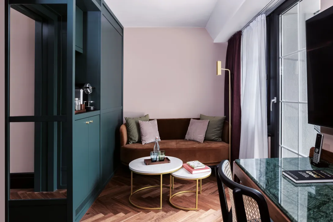 Sorell Hotel Seidenhof Grand Deluxe Seating area with desk and balcony