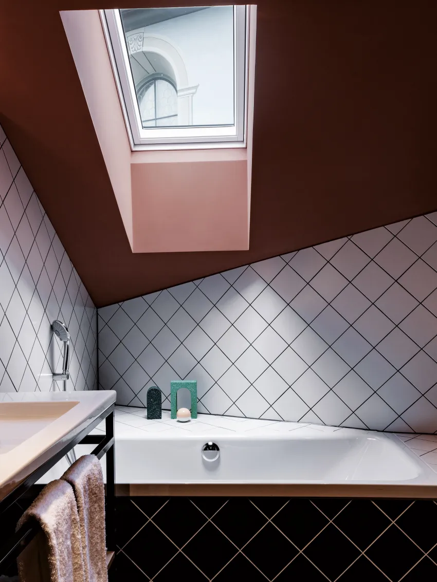 View of a bathroom with bathtub at the Sorell Hotel St. Peter