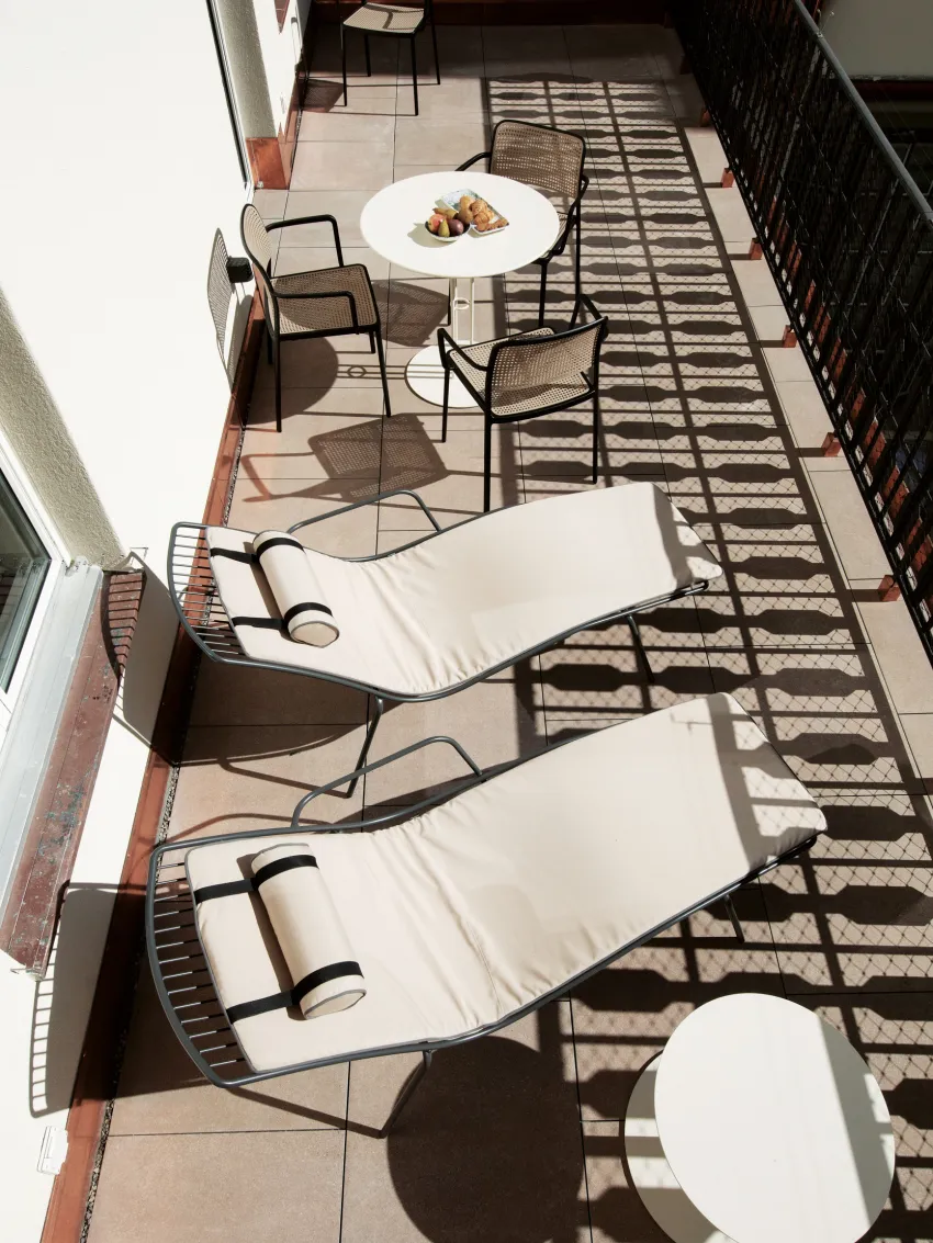 Picture of the terrace with loungers and tables
